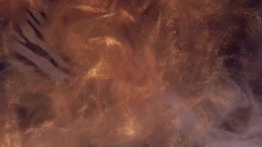Parlayan duman. Mürekkep suyu. Bulanık altın renk parçacıkları dokusu su altı sis akışı hareketi zebra desenli soyut sanat arkaplanı.