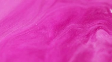 Köpüklü karışım. Bulanık arkaplan. Odaklanmamış pembe renk parıldayan parıltılı mermer desen akrilik mürekkep emülsiyon akış hareketi soyut sanat.