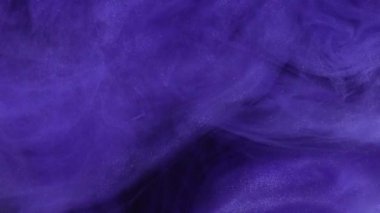 Parıldayan bulut. Boya suyu sıçraması. Odaklanmamış mavi renk parlatıcı toz parçacıkları dokusu parlayan duman akışı soyut sanat arkaplanı.