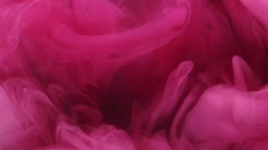 Renkli duman bulutu. Mürekkep damlası. Odaklanmamış parlak mor toz parçacıkları duman dalgası akışı açıcı hareket soyut sanat arkaplanı.