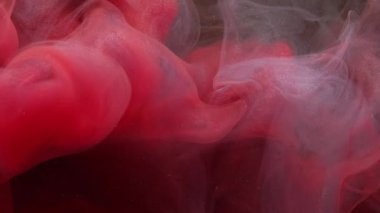 Renkli sis dalgası. Mürekkep su sıçratır. Bulanık kırmızı pembe parlak duman dokusu boya patlama hareketi soyut sanat arkaplanı.