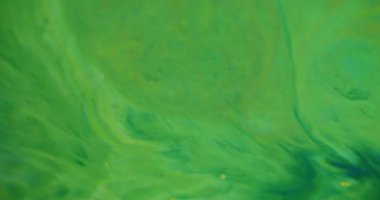 Yeşil döküldü. Boya karışımı. Pürüzsüz geniş akım mermer etkisi ve opak sıvıda çözünen boya. Dalgalı ofset parıltılı suluboya titreşimli emülsiyon.