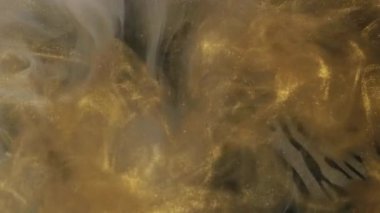 Parlayan duman. Mürekkep suyu. Bulanık altın renk parçacıkları dokusu su altı sis akışı hareketi zebra desenli soyut sanat arkaplanı.