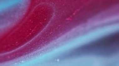 Parlak parçacıklar. Bokeh ışığı. Odaklanamayan kırmızı mavi renk kum dokusu mürekkep dalga hareketi soyut sanat arkaplanı.