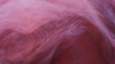 Mürekkep damlası. Parıldayan dalga. Soyut sanat arka planında hareket eden parlak pembe bulutlu buhar buharı..