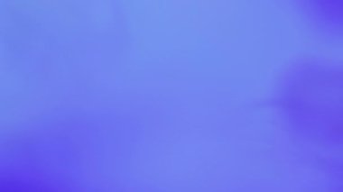 Görüntü dalgası. Mezuniyet geçmişi. Odaklanmamış mavi renkli mürekkep damlası. Buhar bulutu akışı hareketi. Soyut sanat dokusu pürüzsüz..