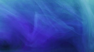 Su girdabı. Sis bulutu. Odaklanamayan parlak mavi çok renkli boya mürekkebi dumanı soyut sanat arka planında hareket ediyor..