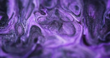 Sıvı partiküller dökülür. Mürekkep karışımı. Bulanık siyah renk parıldayan desen boya karışımı girdaplı soyut sanat arkaplanı.