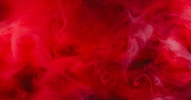 Kırmızı duman. Soyut arkaplan. Bulanık renkli boya, su patlaması, duman, yüzen parlak parçacıklar, sanat dokusu..