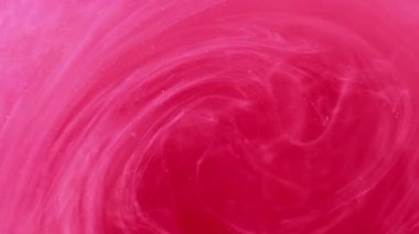 Su dök. Buhar fırıldağı. Odaklanamayan parlak pembe renkli lekeler boya mürekkebi bulutu soyut modern sanat arka planında ilerliyor.