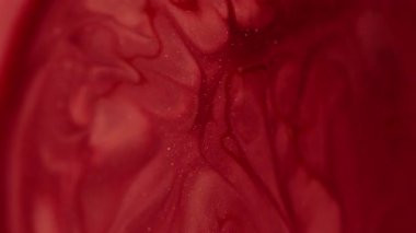 Karışık sıvı. Mermer diş minesi. Bozuk kırmızı opak boya. Altından yapılmış renkli mürekkep, dalgalı taş desenli, sanatsal kıvrımlar..