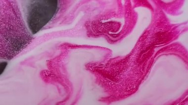 Işıltılı diş minesi. Sanat sıvısı. Gri, beyaz, bilye, ıslak, yüzey, fantezi girdabı. Odaklanamayan ışıltılı boya soyut arkaplan.