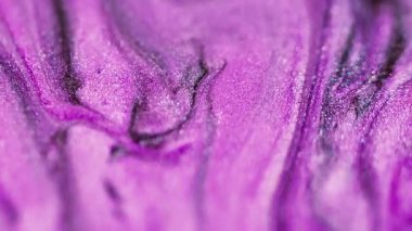 Işıldayan sıvı karışımı. Parlak sıvı. Odaklanmamış pembe renkli parlak desenli mürekkep dalgası soyut sanat arkaplanı Bokeh ışık.