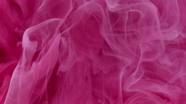 Sis akışı. Su damlasını boya. Odaklanmamış pembe renk buhar bulutu sıçrayan girdap yayılıyor hareket soyut sanat arkaplanı ortaya çıkıyor.