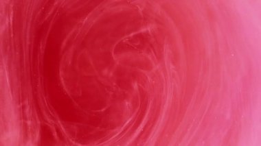 Su dök. Buhar fırıldağı. Odaklanamayan parlak pembe renkli lekeler boya mürekkebi bulutu soyut modern sanat arka planında ilerliyor.