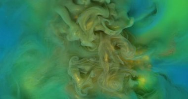 Dönen sis. Parlak mürekkep. Soyut sanat arkaplanına yayılan su buğulama sıvısında dönen mavi sarı renkli boya..