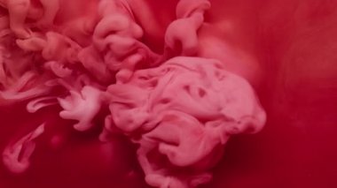 Buhar akışı. Atmosferik duman. Odaklanmamış kırmızı pembe renk mürekkep buharı su buharı dalgası soyut sanat yaratıcılığı arka planında yüzüyor..