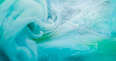 Sanat sisi. Bulut boyası. Renkli duman emülsiyon kıvrımlı akış karışımı pigmenti. Mavi yeşil sıvı boya soyut sıvı dökülmüş arka plan.