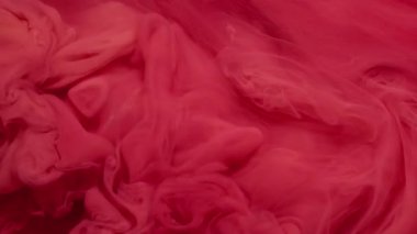 Döndürme sıvısı. Bulut mürekkebi. Odaklanamayan pembe kırmızı duman sıvı egzoz kimyasal dokusu sanatın soyut yaratıcı arka planına yayılıyor.