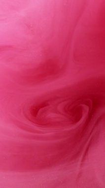 Dikey video. Işıltılı sis girdabı. Suyu boya. Odaklanmamış parlak kırmızı renk gradyanı parlak partiküller buhar dalgası hareketi soyut sanat arkaplanı.