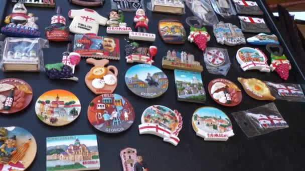 Array Colorful Georgian Souvenir Magnets Showcased Sales Desk Mtskheta Georgia — Stock Video