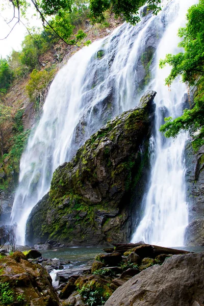 stock image Khlong Lan Waterfall is beautiful in the rainy forest and is a famous waterfall of Kamphaeng Phet Province, Thailand.