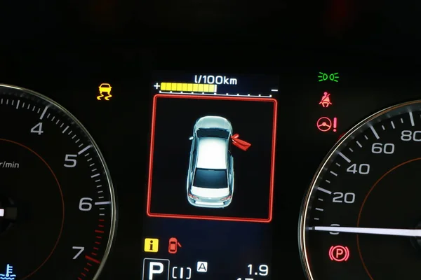 Car door opening warning light in the dashboard