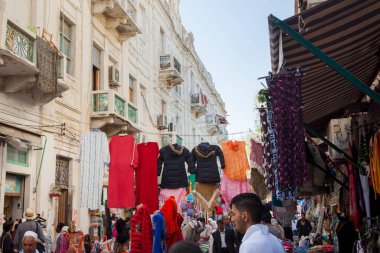 4 November 2009, Tripoli, Libya. A street market with vendors selling fabrics and other products in the old part of the city, the medina, Ghadema. clipart