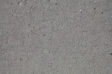 Gri asfalt dokusunun arkaplanı