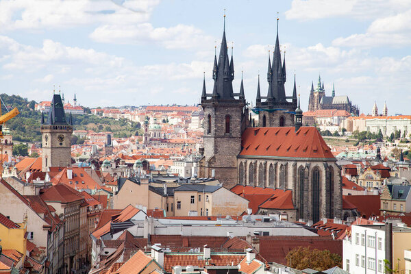 Prague, Czech Republic - 07-09-2024 - Tiled roofs and sightseens in old town of Prague