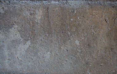 Gözenekli gri-kahverengi betonun arkaplan dokusu