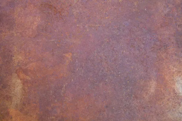 Paslı metal bir levhanın yakın plan çekimleri ve aşınma izleri. Sanayi geçmişi