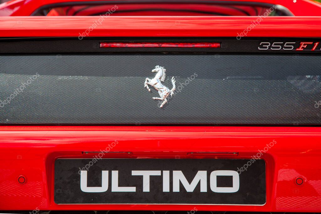 Vilnius, Lithuania - 31-05-2025 - Back view with logo of Classic Red Vintage Ferrari 355 F1 Berlinetta