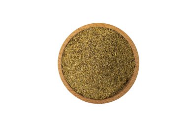 dried common chamomile flowers in latin - Matricaria chamomilla in wooden bowl isolated on white background. Medicinal herb.