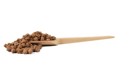 brown chickpeas on wooden spoon isolated on white background. nutrition. food ingredient.