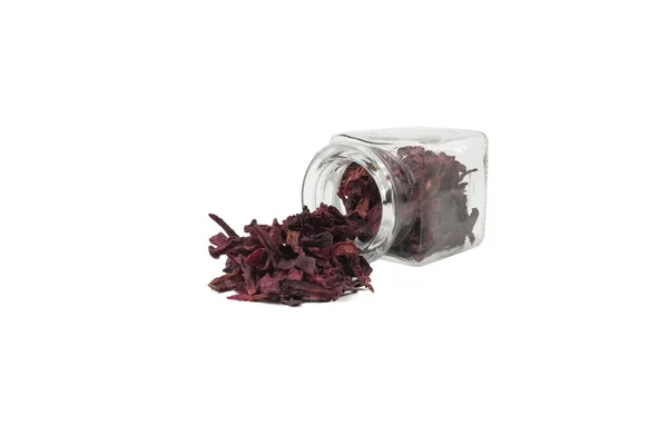 stock image Dried beetroot slices falling out of the glass jar. food ingredient.