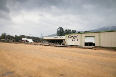 a road in the village after Hurricane Helene clipart