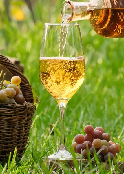 Pouring White Wine Bottle Glass Wooden Table Green Grapes Grape — Stock Photo, Image