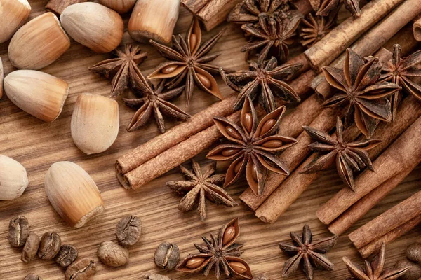 Background Cinnamon Sticks Anise Stars Coffee Beans Nuts Spicy Trendy — Stock fotografie