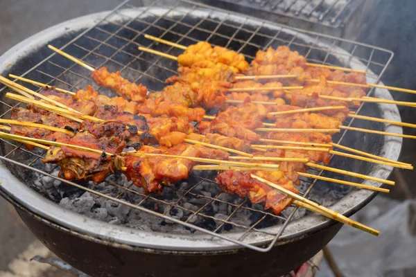 stock image Thai street food. Barbecue roast in temple fair, and night local markets in Thailand. Retail shops