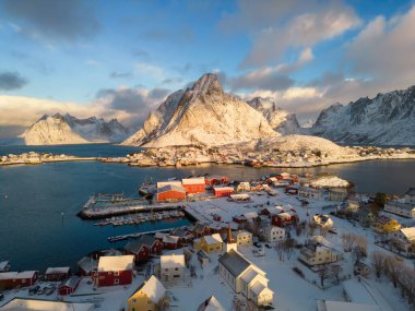 White snow mountain in Lofoten islands, Nordland county, Norway, Europe. Hills and trees, nature landscape in winter season. Winter background.