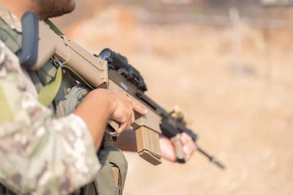 stock image Team of U.S. Army marine corps soldier military war with gun weapon participating and preparing to attack the enemy in Thailand during exercise Cobra Gold training in battle. Combat force.