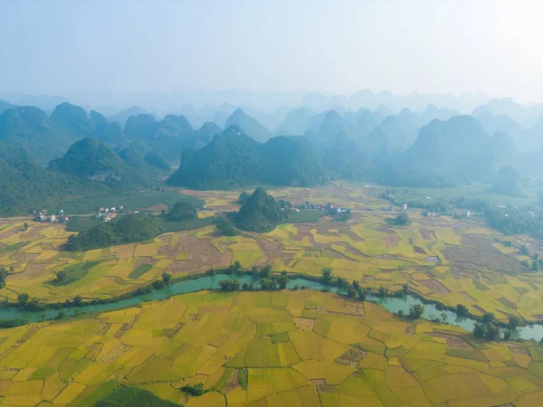 stock image Aerial top view of fresh paddy rice terraces, green agricultural fields in countryside or rural area of Cao Bang, mountain hills valley in Asia, Vietnam, China border. Nature landscape background.