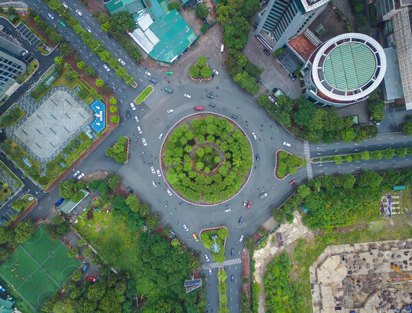 Wongwian Yai roundabout. Aerial view of highway junctions. Roads shape circle in structure of architecture and technology transportation concept. Top view. Urban city, Bangkok, Thailand.
