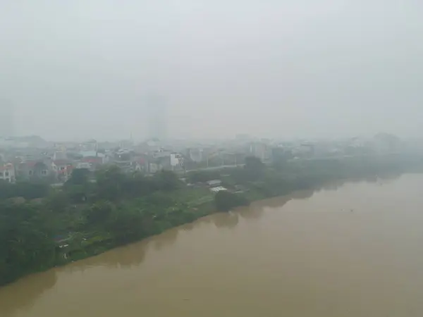 stock image Aerial view of Hanoi Downtown Skyline with fog mist, Vietnam. Financial district and business centers in smart urban city in Asia. Skyscraper and high-rise buildings.