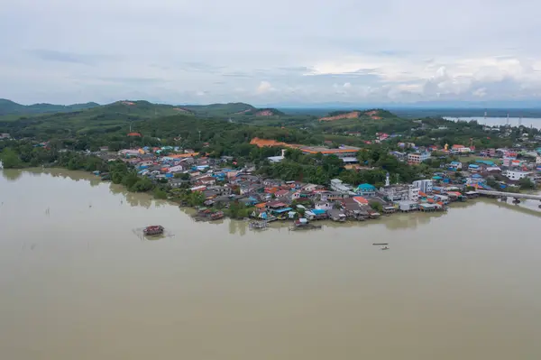 stock image Aerial view of fishing trap net in canel with fisherman urban city village town houses, lake or river. Nature landscape fisheries and fishing tools at Pak Pha, Songkhla, Thailand. Aquaculture farming
