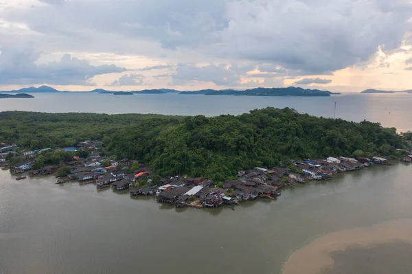 Aerial view of Ranong City, The Floating village urban city town houses, lake sea or river. Nature landscape fisheries and fishing tools, Thailand. Aquaculture farming