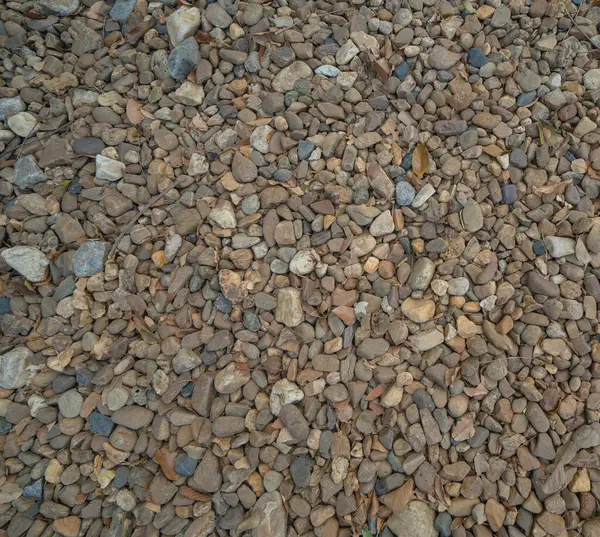 花崗岩の砂利石の床のパターンの表面の質感 デザイン装飾の背景のための外装材のクローズアップ 瓦礫の山 — ストック写真