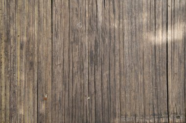 Doğal ahşap çatallı duvar veya lath hattı düzenlenir. Döşeme deseni yüzey dokusu. Tasarım dekorasyonu için iç mimari materyalinin yakın plan görüntüsü.