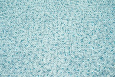 Mavi ya da turkuaz yüzme havuzunun yüzeyi. Yaz mevsiminde duvar kağıdı için temiz su dalgaları. Kalıpsal madde dokusu. Doğa arkaplanı,